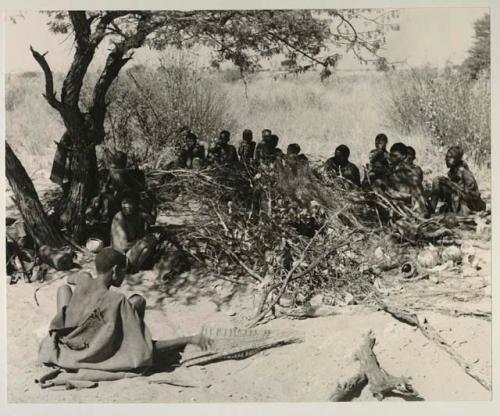 Members of the visiting band from Okwa sitting with Oukwane's group, in Oukwane's werft