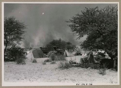 Expedition camp, with veld fire in background