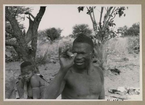 Visiting man demonstrating huntinghand signals

