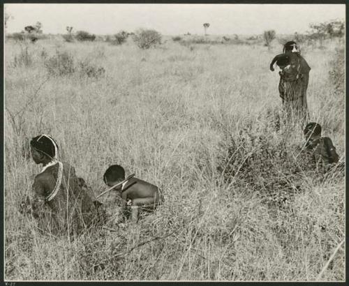 Tsi gathering: Group of women and children gathering tsi (print is a cropped image)