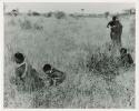 Tsi gathering: Group of women and children gathering tsi (print is a cropped image)