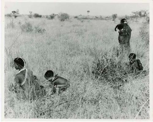 Tsi: Group of women and children gathering tsi (print is a cropped image)