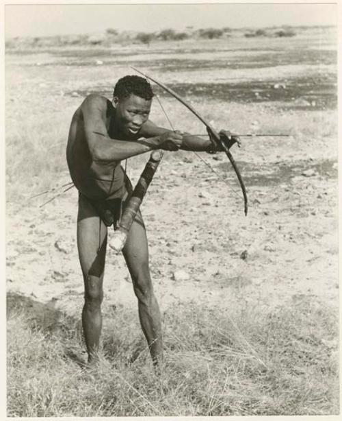 "The hunting hand signs": "Crooked /Qui" demonstrating shooting an arrow (print is a cropped image)