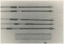 Hunting equipment: Five arrows and ruler for measurement (print is a cropped image)