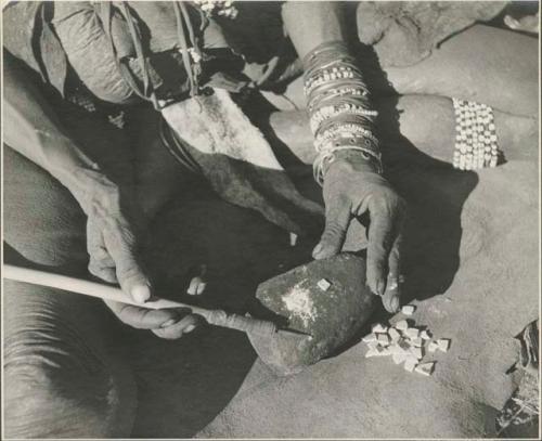 "Old /Gam" making ostrich eggshell beads
