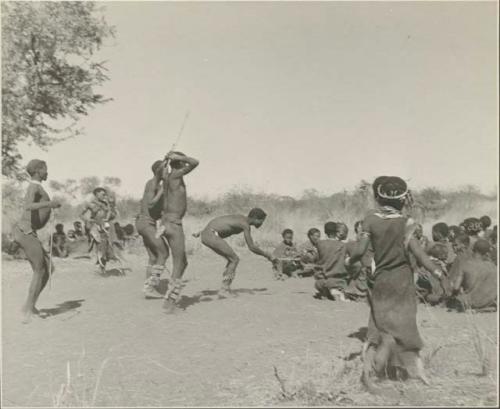 Men entering a curing dance
