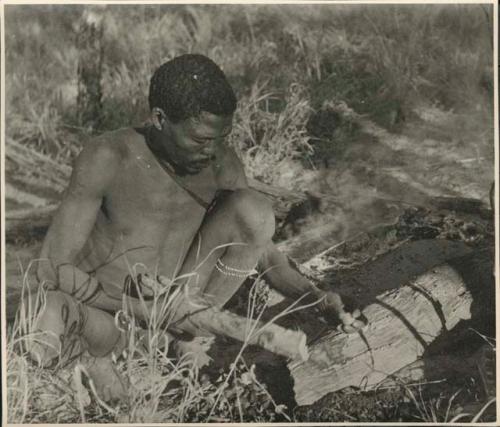 "Gao Medicine" cracking mangettis, with another man with bow beside him (print is a cropped and enlarged image)
