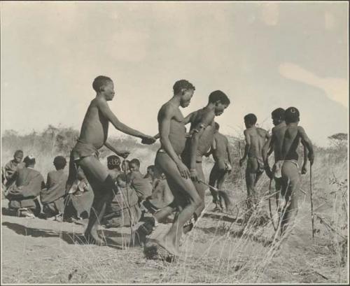 Group of Ju/'hoansi dancing, with "/Gao Music" in foreground
