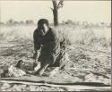 Kernel Ledimo ironing his clothes
