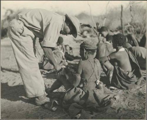 Kernel Ledimo with a group of Ju/'hoan women 
