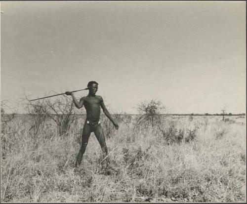 Hunter throwing an assegai