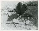 [No folder title]: "Gao Medicine" applying poison to arrows (print is a cropped image)