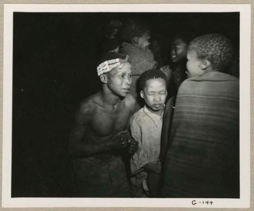 "Ngami in trance, Tsho/ana": Ngani dancing beside Tsamgao (≠Toma's son) at a night dance (print is a cropped image)