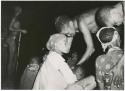 "Night dance at Tsumkwe 1957-8, some published in my [Lorna Marshall's] dance paper": /Gunda and /Ti!kay curing people (print is a cropped image)