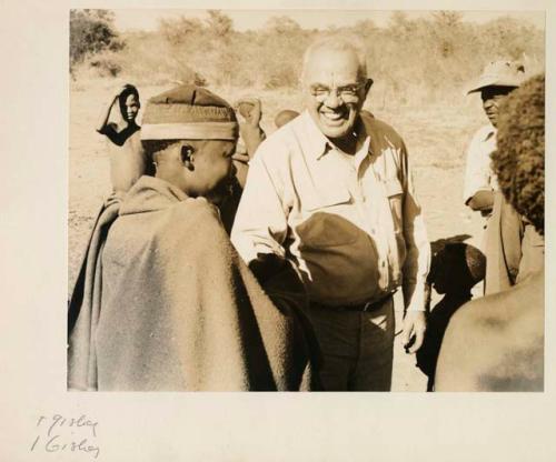 /Gishay, son of "Old Gau," standing with Laurence Marshall



