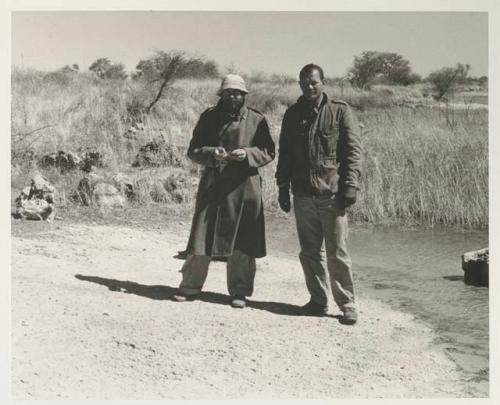 Robert Story and William Donnellan standing



