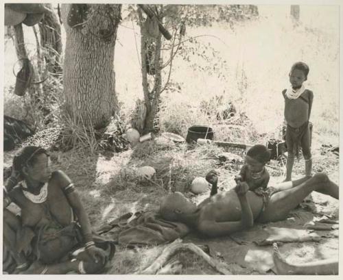 Di!ai sitting, and her two boys playing with "≠Gao Lame"