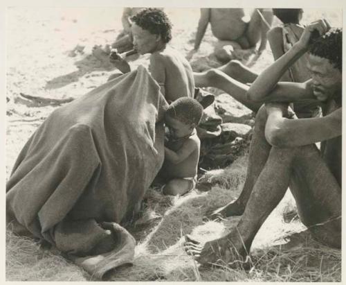 /Naoka and "Gao Medicine" sitting, and a group of children under a kaross
