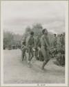 Curing dance for a sick baby at Moremi’s farm; men dancing behind the women (print is a cropped image)