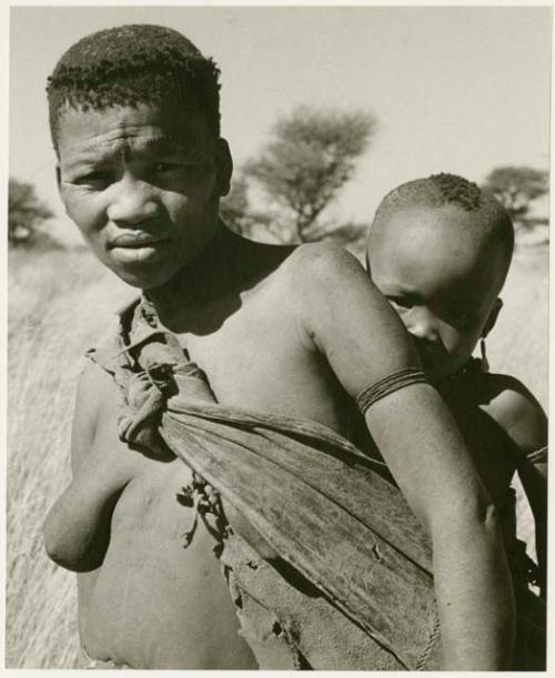 Portrait of Tsekue with N!whakwe on her back (print is a cropped image)