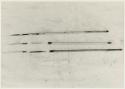 Three arrows against a white background with a ruler for measurement; shows bone point, connecting link, and shaft separated (print is a cropped image)