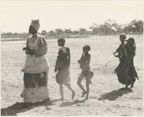 Women and children walking