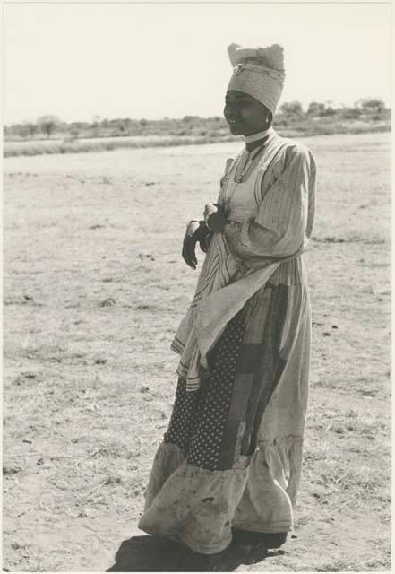 Woman standing, profile