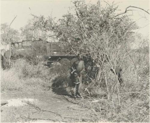 Unidentified boy holding "Little ≠Gao's" arm









