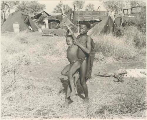 Unidentified boy carrying "Little ≠Gao"









