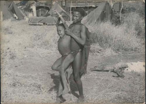 Unidentified boy carrying "Little ≠Gao"









