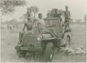 John Marshall and unidentified Ju/'hoansi in a Jeep







































