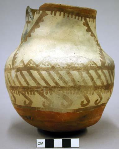 Jar, eccentric painted ware. brown on buff. 16.5 x 14.5 cm.