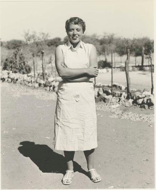 Elizabeth Marshall Thomas in a dress, full figure standing

