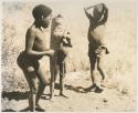 Tsamgao, "Little ≠Gao," and /Gaishay (!U and ≠Toma's son), dancing
