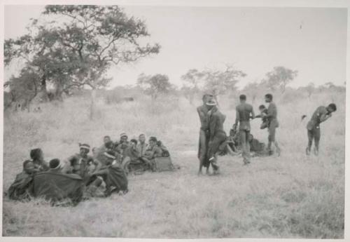 Medicine man and a group people