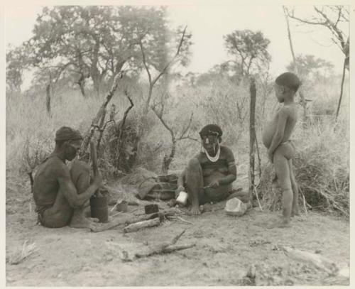 Three-member family in their living place
























