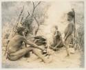 Three-member family in their living place, with the smoke of the fire rising
























