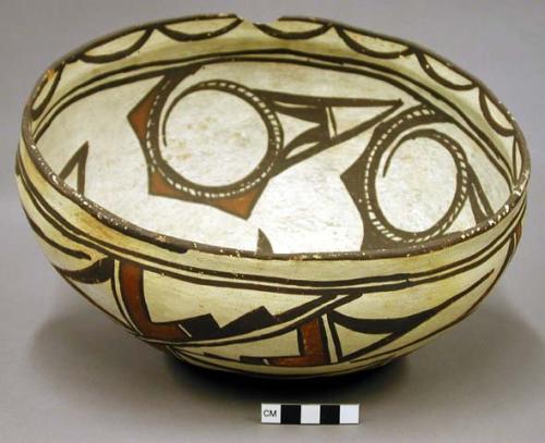 Bowl, polacca polychrome style c. int: zuni rain bird design; ext: linear design