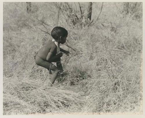 Back view of /Gaishay shooting an arrow






















