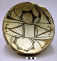 Bowl, polacca polychrome style c. int: zuni rain bird design; ext: linear design