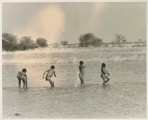 Boys playing in the water






