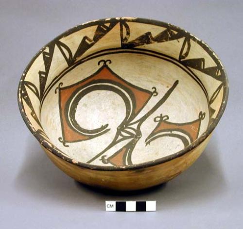 Stew bowl, polacca polychrome style c. int: zuni rain bird design; ext: slipped,