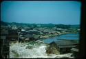 Village along shore, with shell midden