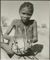 "Music": Boy playing the //guashi (print is a cropped image)