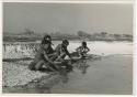 "Pan": Women and girls at the edge of Nama Pan (print is a cropped image)