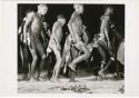 [No folder title]: Men dancing in a circle in a night dance (print is a cropped image)