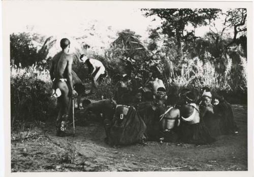 [No folder title]: Group of people sitting and watching dancers who have danced all night