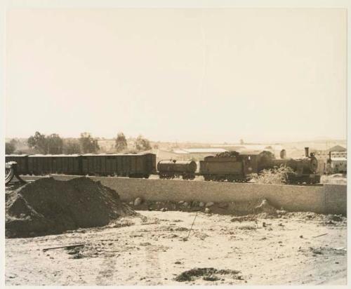 Freight train and buildings