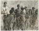 Group of women standing with Kernel Ledimo and William Donnellan