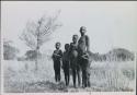 Group of children standing near Muzwamo River
